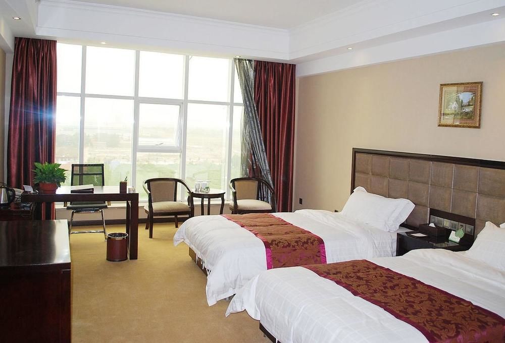 Weishi International Hotel Qing Zhou エクステリア 写真