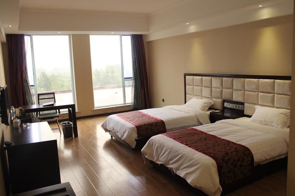 Weishi International Hotel Qing Zhou エクステリア 写真